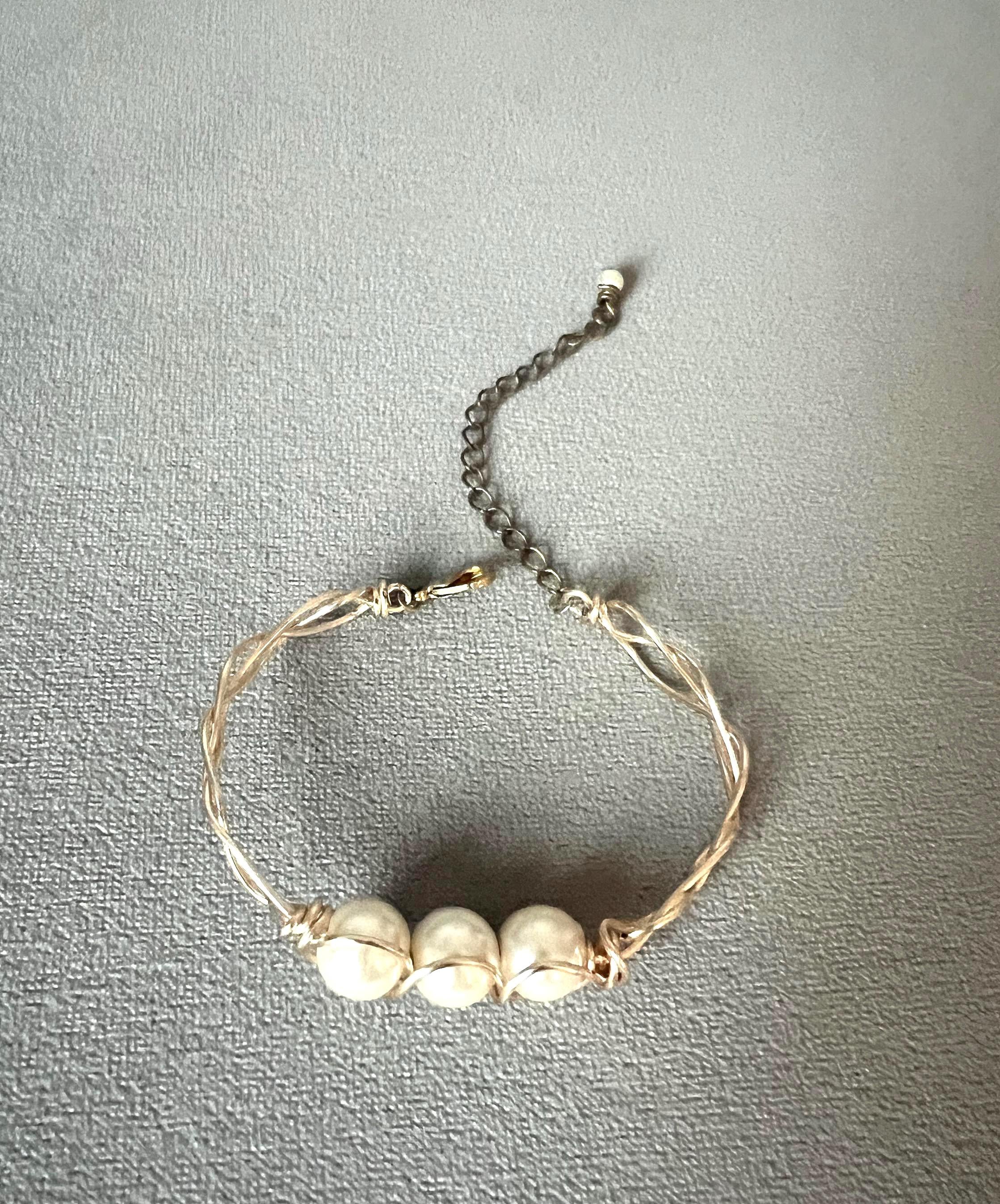 Golden Braided Cage Pearl Bracelet