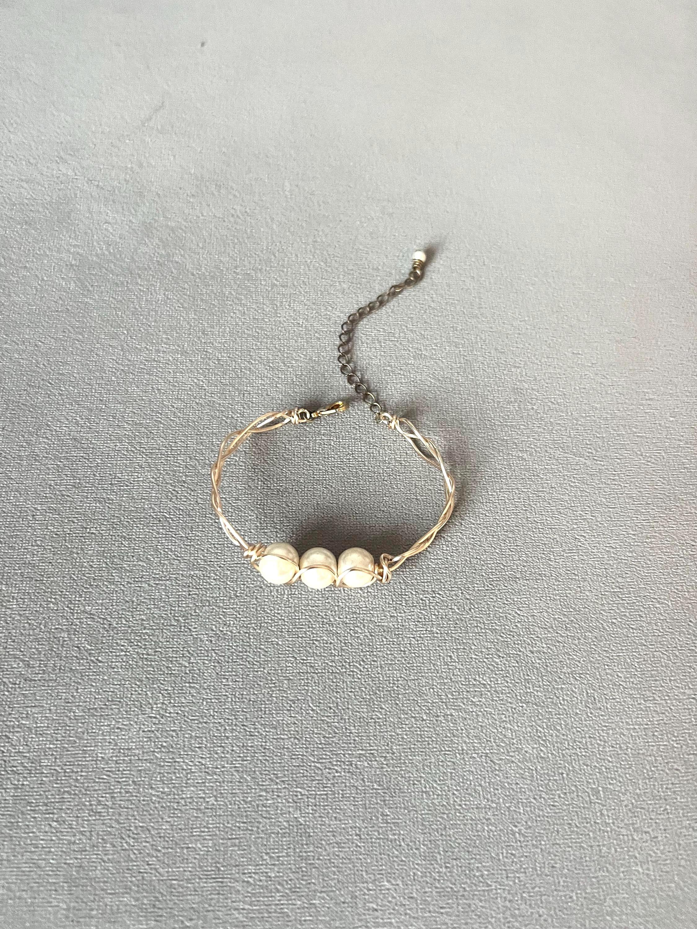 Golden Braided Cage Pearl Bracelet