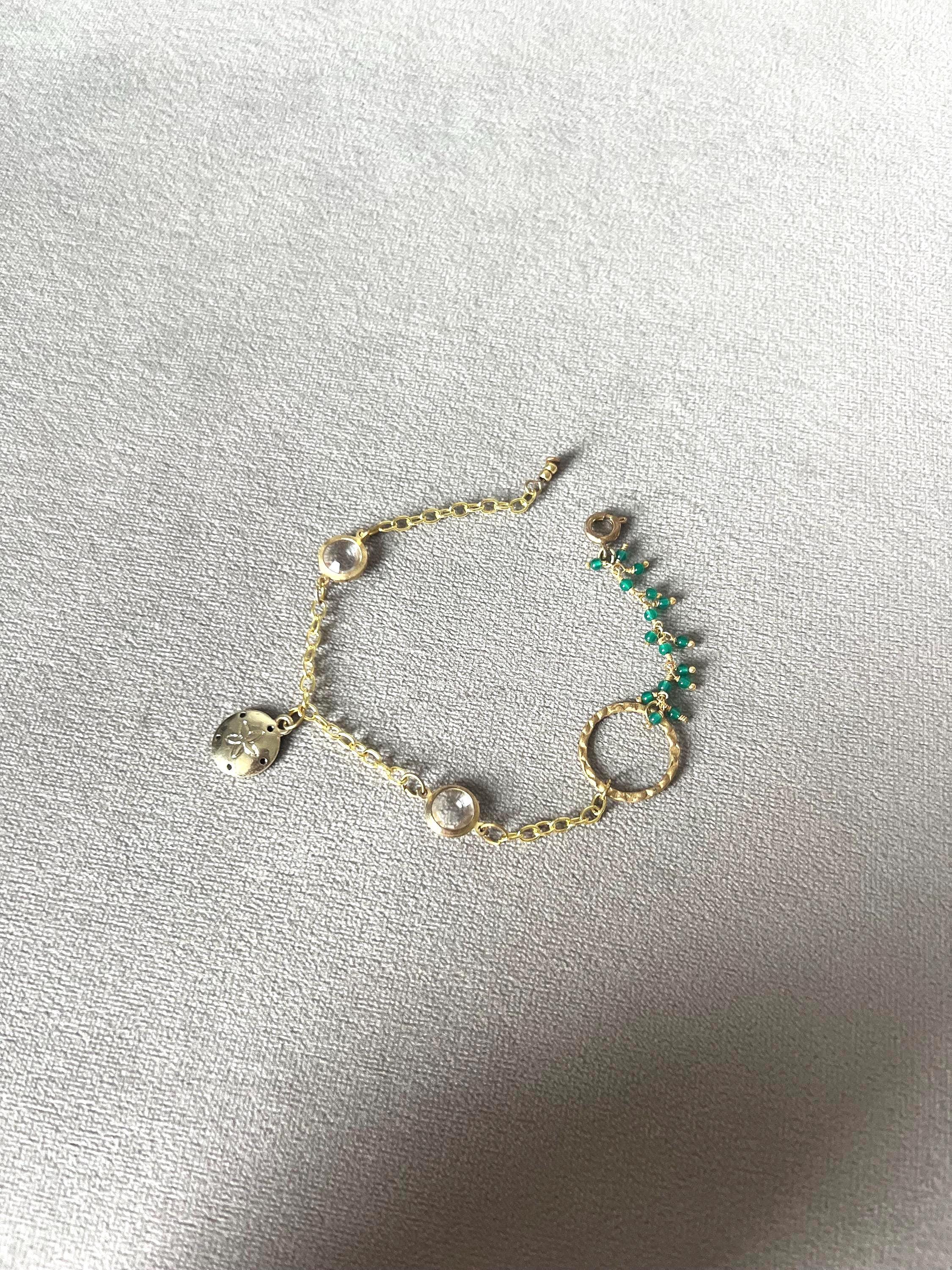 Gold Charm Bracelet with Sand Dollar & Emerald Cluster Accents