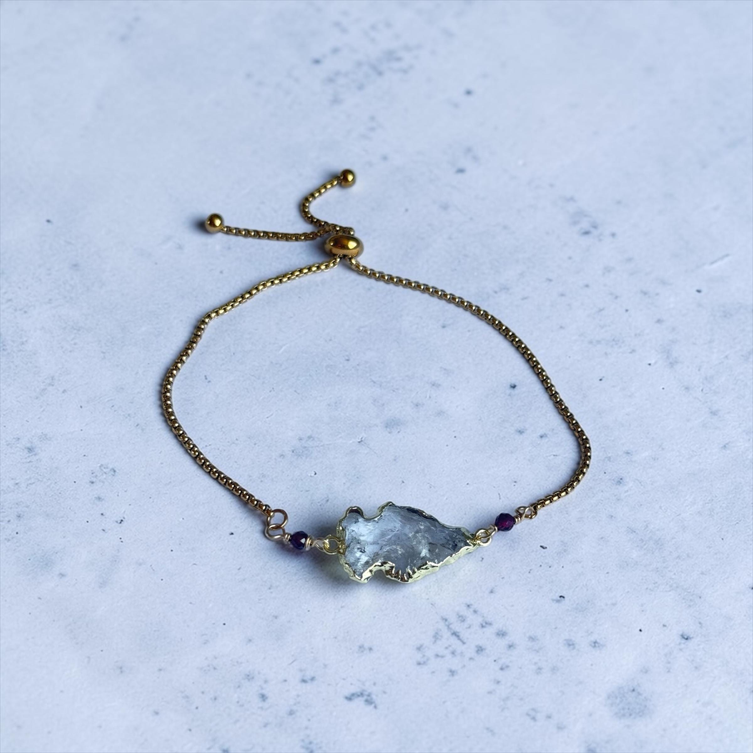 Golden Apex Quartz Bolo Bracelet — Ruby Pulse Edition