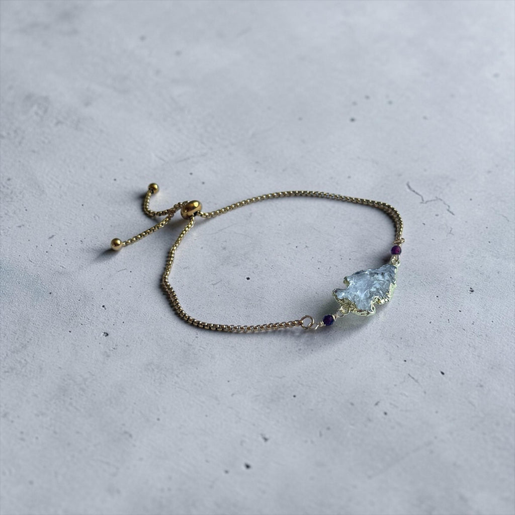 Golden Apex Quartz Bolo Bracelet — Ruby Pulse Edition