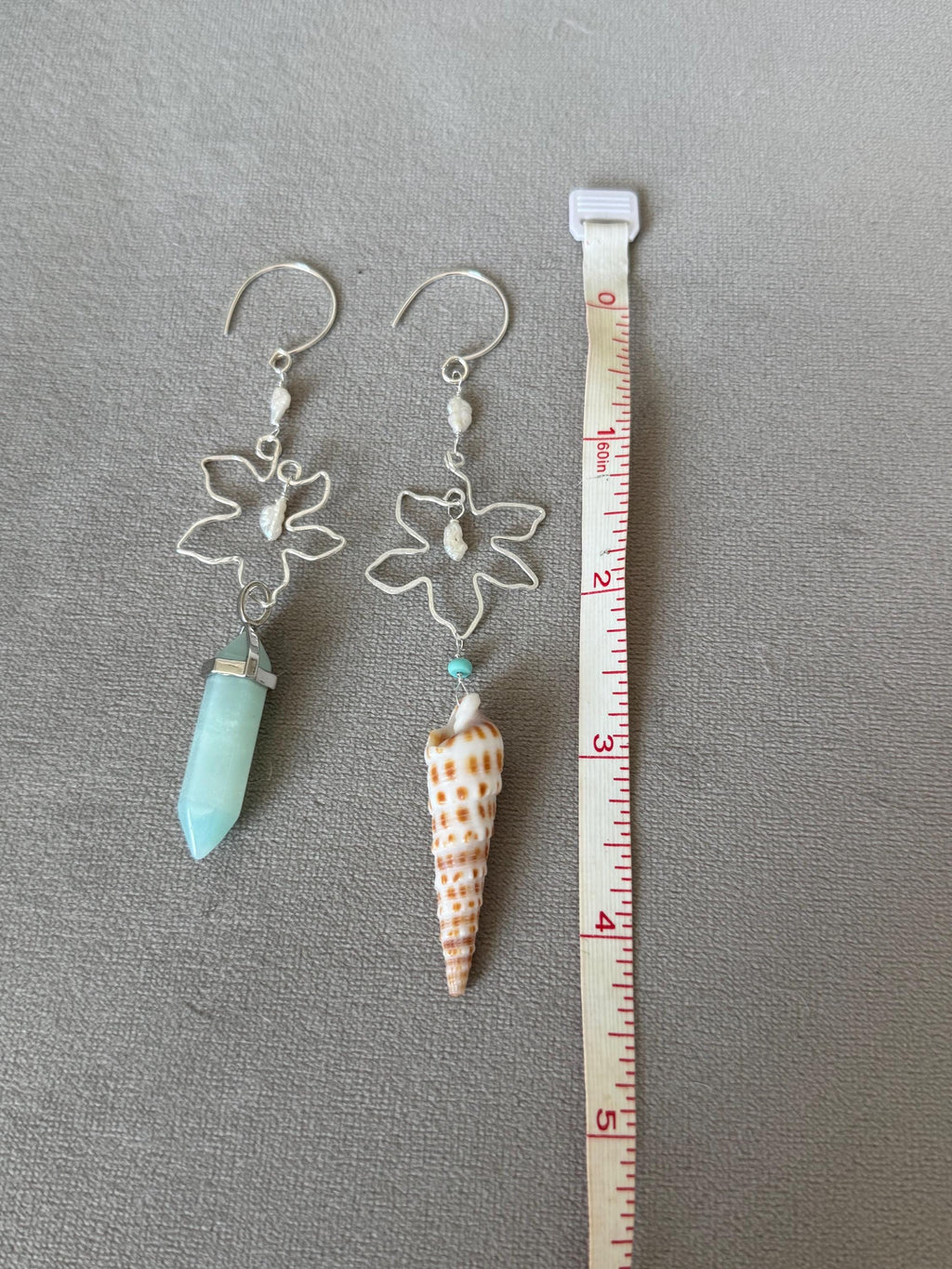 Tidal Bloom Asymmetry Drops