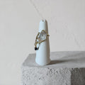 Obsidian Tide Hammered Quartz Ring